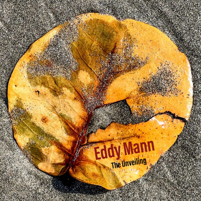 When Revelation Becomes a Whisper: Eddy Mann Unveils Faith, Fire, and Hope on The Unveiling